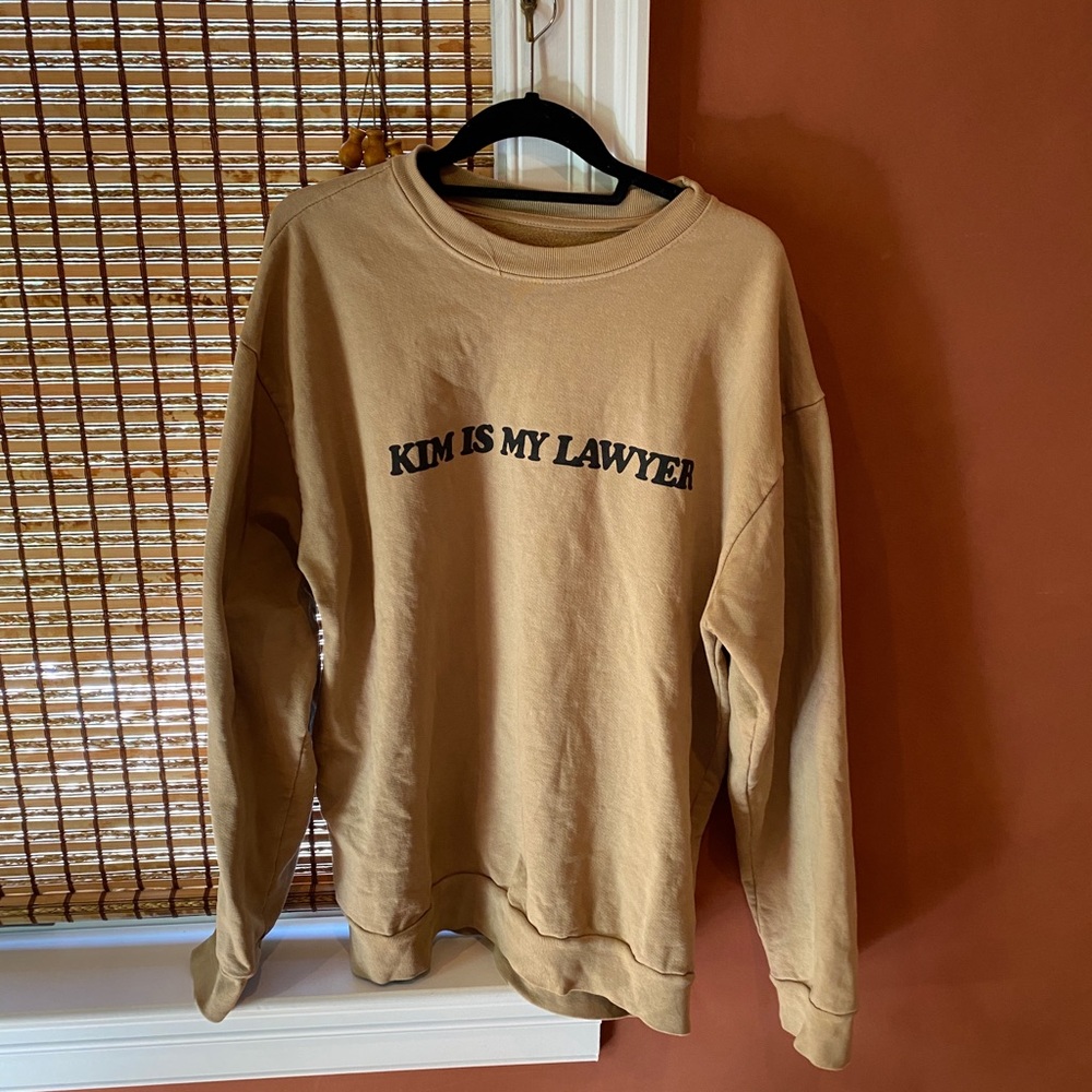 Talentless “Kim is My Lawyer” sweatshirt in beige by Scott Disick.